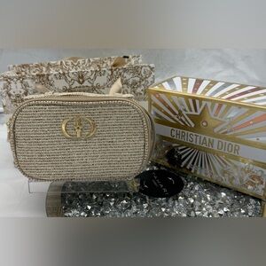 Christian Dior Beauty Holiday 2025 pouch in a gold metallic finish.